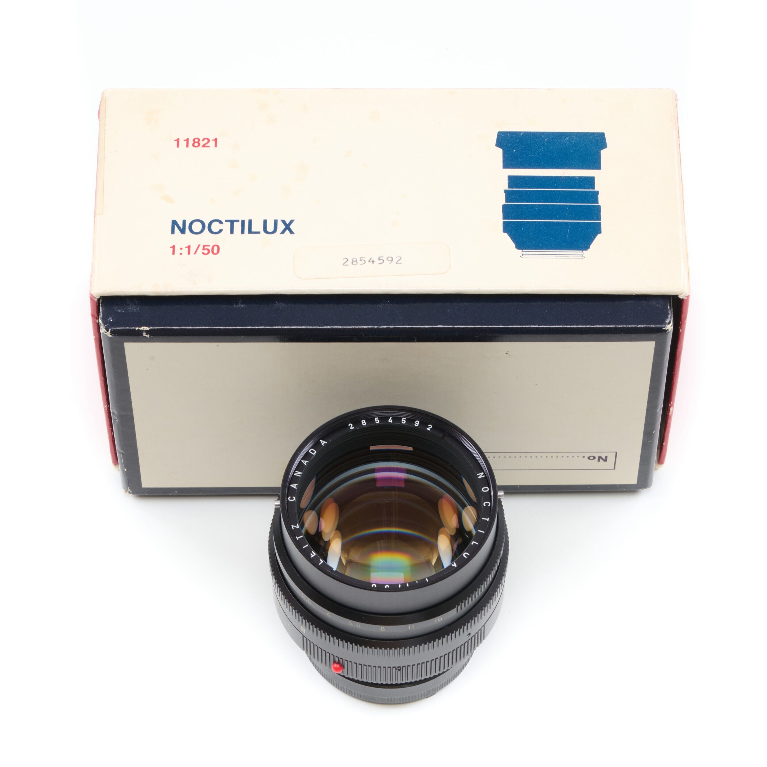 Leitz 50mm f1 Noctilux E58 + 12519 Zonnekap 2e Batch + Doos
