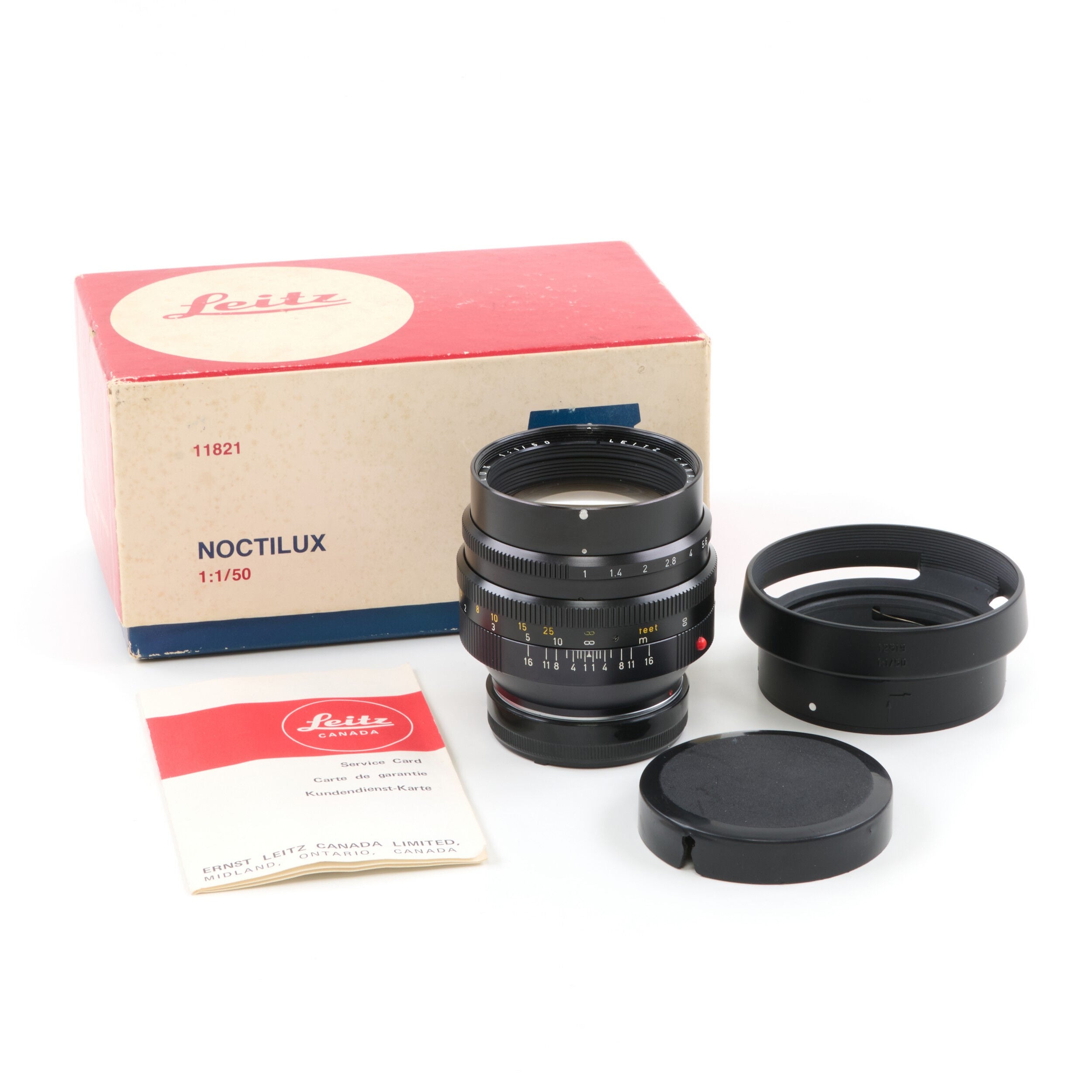 Leitz 50mm f1 Noctilux E58 + 12519 Zonnekap 2e Batch + Doos