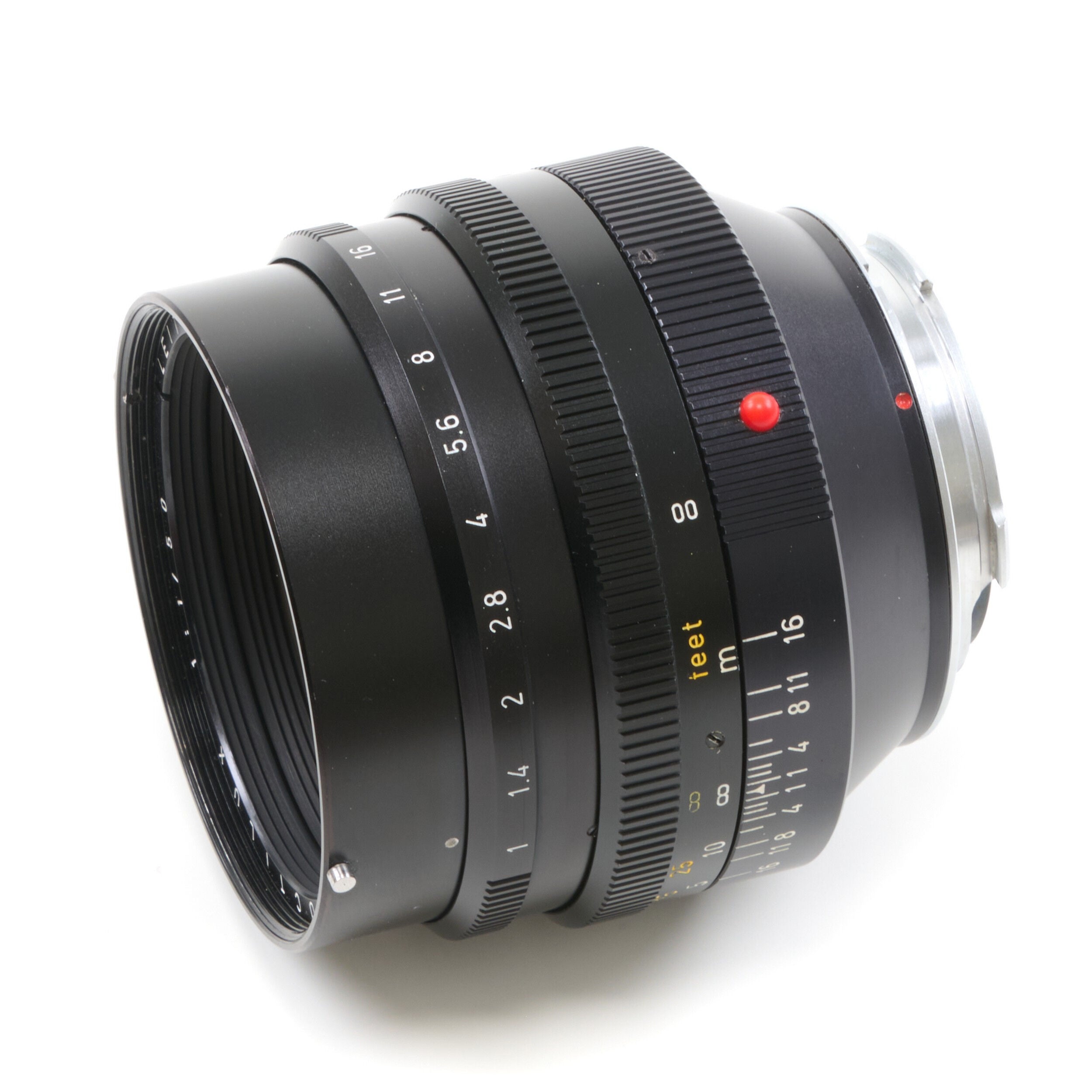 Leitz 50mm f1 Noctilux E58 + 12519 Zonnekap 2e Batch + Doos